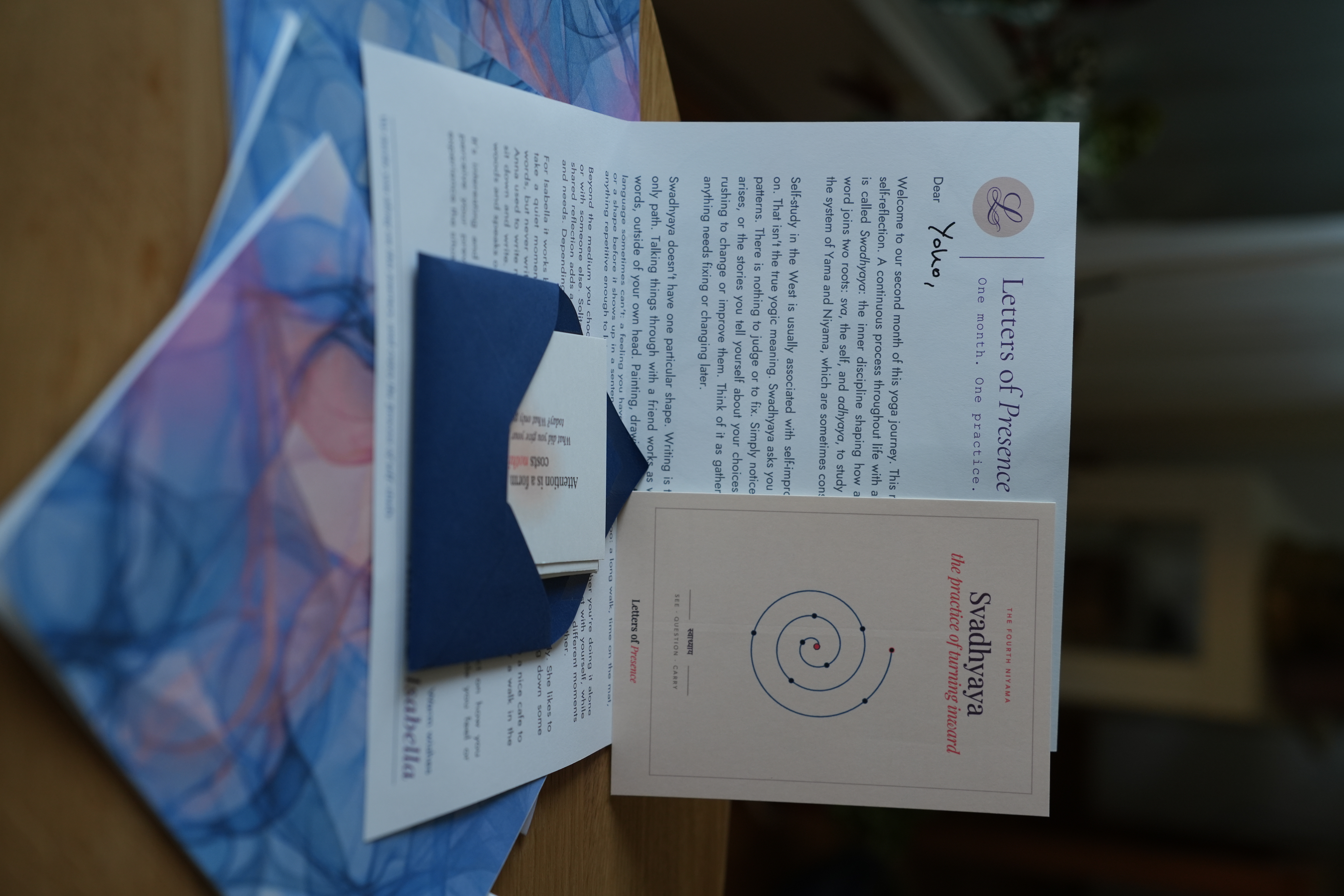 The Svadhyaya set: letter, practice card and navy envelope with reflection cards